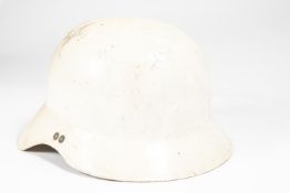 A Third Reich WWII period white fibreglass Luftschutz helmet, with foam top pad, webbing