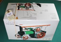 A Mamod live steam Steam Tractor. Traction Engine in green, red and black. Boxed with accessories