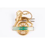 British Railways (Southern Region) STATION MASTER cap badge. Brass and green enamel lion over wheel,