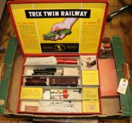 A Trix Twin Railway OO gauge train set. Comprising; US outline 0-4-0 tender locomotive, 3747, in