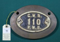 A Great Western Railway (GWR) cast iron oval plate. (135mm wide). Marked G.W.R. 110 P.W.B. mounted