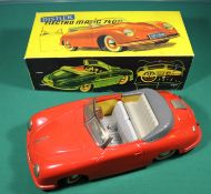 3x 1960s 1:18 scale cars. A Victory Industries MG TF battery operated car in green. Boxed, some