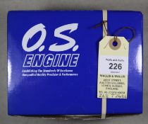 O.S. model aircraft engine for radio controlled aircraft. Model No. MAX 55AX /15610, complete with