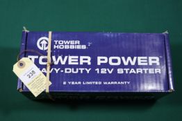 Tower Hobbies Tower Power Heavy-Duty 12V Starter. A model aircraft engine starter for engines up