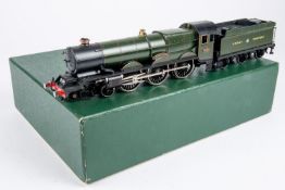 An OO gauge brass GWR King Class 4-6-0 tender locomotive. Superbly finished as a fictional King