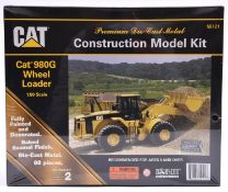 A Norscot CAT Construction Model Kit of a Cat 980G Wheel Loader. 1:50 scale. A metal fully painted