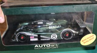 5x diecast cars by various makes. An Auto Art Motorsport 1:18 scale Bentley Speed 8 Le Mans 2003, 8,