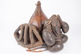 Vintage boxing equipment: a pair of "Hank Bryan" boxing gloves; also a good leather punch ball,