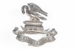 A silver cap badge of the Liverpool Pals, HM London 1914, with maker's mark "E&Co". GC £200-250