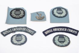 Royal Observer Corps cap badge, rank badges (4), titles (2). (7) £40-60