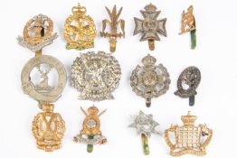 Eight Yeomanry cap badges: Warwickshire, Hampshire Carabiniers, Gloucestershire Hussars, GRVI