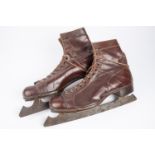 A pair of Embekay vintage ice skating brown leather boots, steel blades marked "51" and "John Wilson