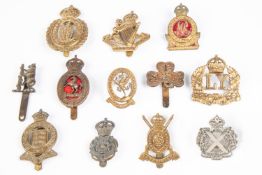 Twelve Yeomanry cap badges: Warwickshire (Gaunt), Yorks Dgns. black (F.N. B'ham), pre 1915