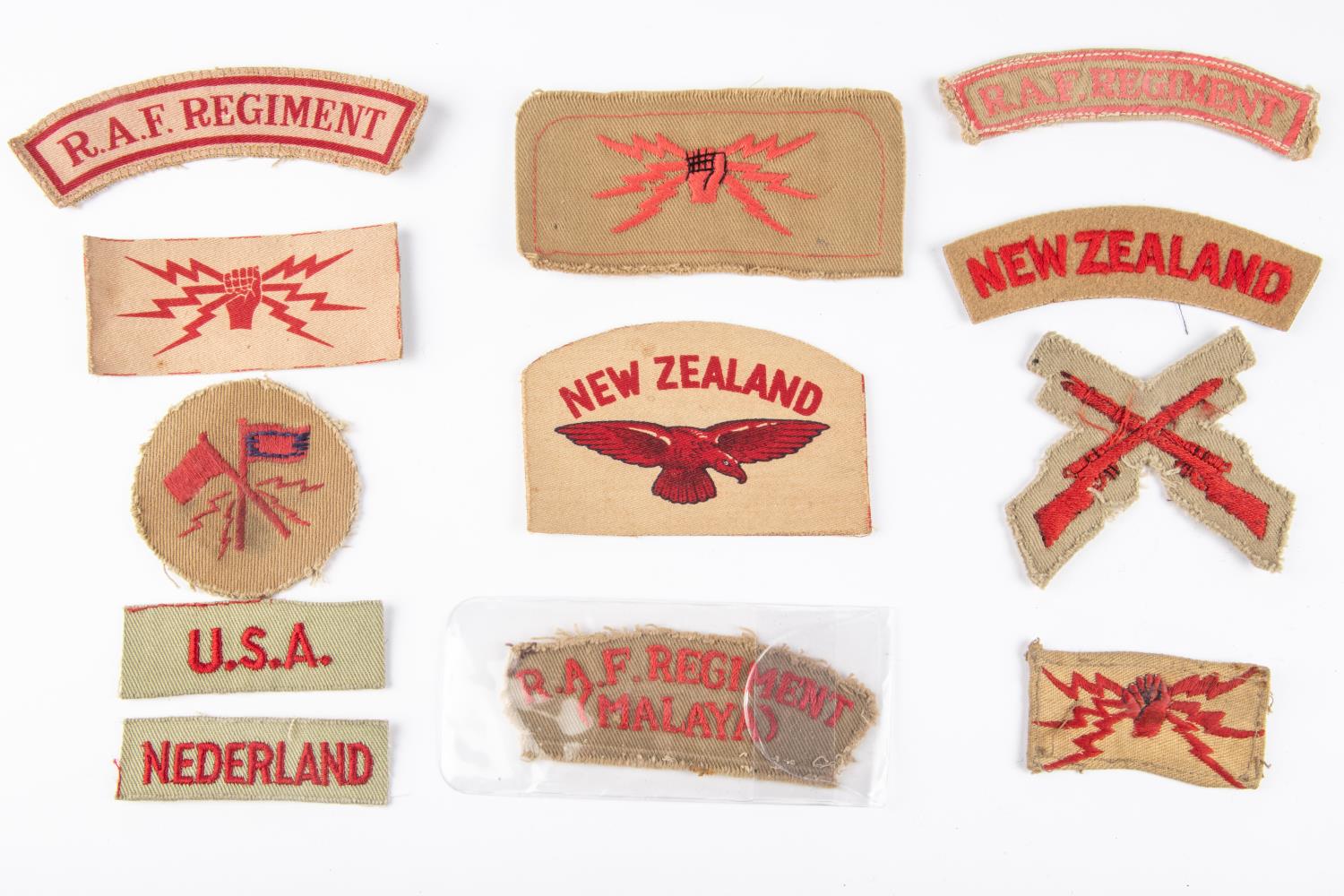 A good selection of WWII RAF Tropical insignia, inc. Marksman, Radio Operator (3), Signaller, RAF