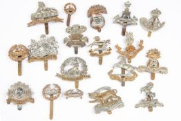 Eighteen Infantry cap badges: Kings (pre and post 1926), Norfolk (pre 1937), Lincolnshire,