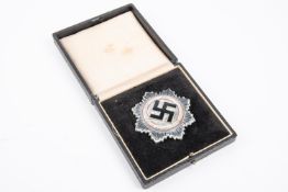 A Third Reich German Cross in silver, marked "1" on pin, in its case of issue. GC £150-175