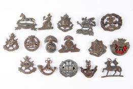 16 Infantry officers' bronze cap badges, all with prong fittings, including post 1920 Queens,