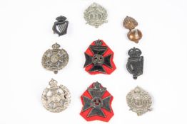 Nine London Regiment cap badges: pre 1920 5th Bn (2), 6th Bn, 7th Bn, 8th Bn (2, cast with