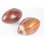 A brown leather vintage rugby ball; also an American Football marked "Maybusch Bros. Kansas City".
