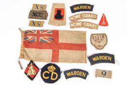 WWII cloth badges: 5 Home Guard items, 4 Air Raid Wardens titles, NCC slip on and 6 other items.