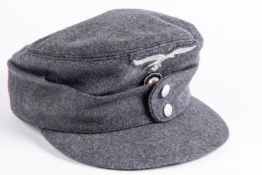 A good Third Reich Luftwaffe soft peaked cap Bergmutz, with wool embroidered eagle and cockade,