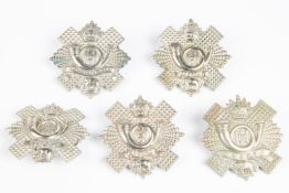 Five Scottish Highland Light Infantry glengarry badges: Victorian, post 1902 (2), long scroll with