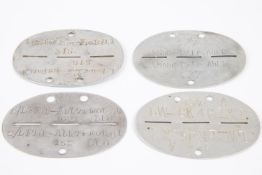 Third Reich aluminium dog tags, L Flak, Bruckbau FRS BATL, Komp. PZ.Ers. Abt.1 and one other. GC £