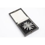 A Third Reich War Service Cross, 1st class with swords, silvered finish, in its case of issue. GC £
