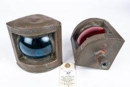 A pair of ships small brass electric navigation lamps, with green and red bulls eye lense and