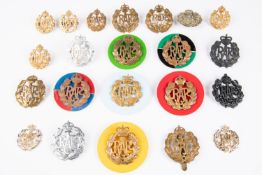 15 RAF OR's cap badges, including 4 on coloured plastic discs (red and green KC, blue and yellow