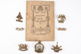 Five Royal Naval Division cap badges, all with Gaunt, London plates: Drake, Hawke, Hood, Anson and