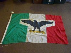 A WWII Italian stitched flag, 150cm x 85cm, with applied printed panel of eagle, etc. GC £65-75