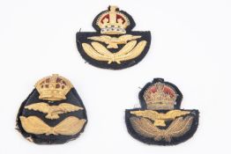 3 RAF officers' cap badges inc early metal padded, all metal flat and bullion wire patterns. £60-100