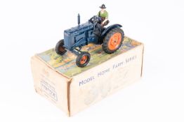 A Britains Fordson Major Tractor with driver (128F) from the Model Home Farm Series. In dark blue