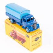 A Dinky Toys Austin Covered Wagon (413). In dark blue with mid-blue tin-plate tilt and wheels.