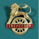 British Railways (Midland Region) INSPECTOR cap badge. Brass and red enamel lion over wheel, with