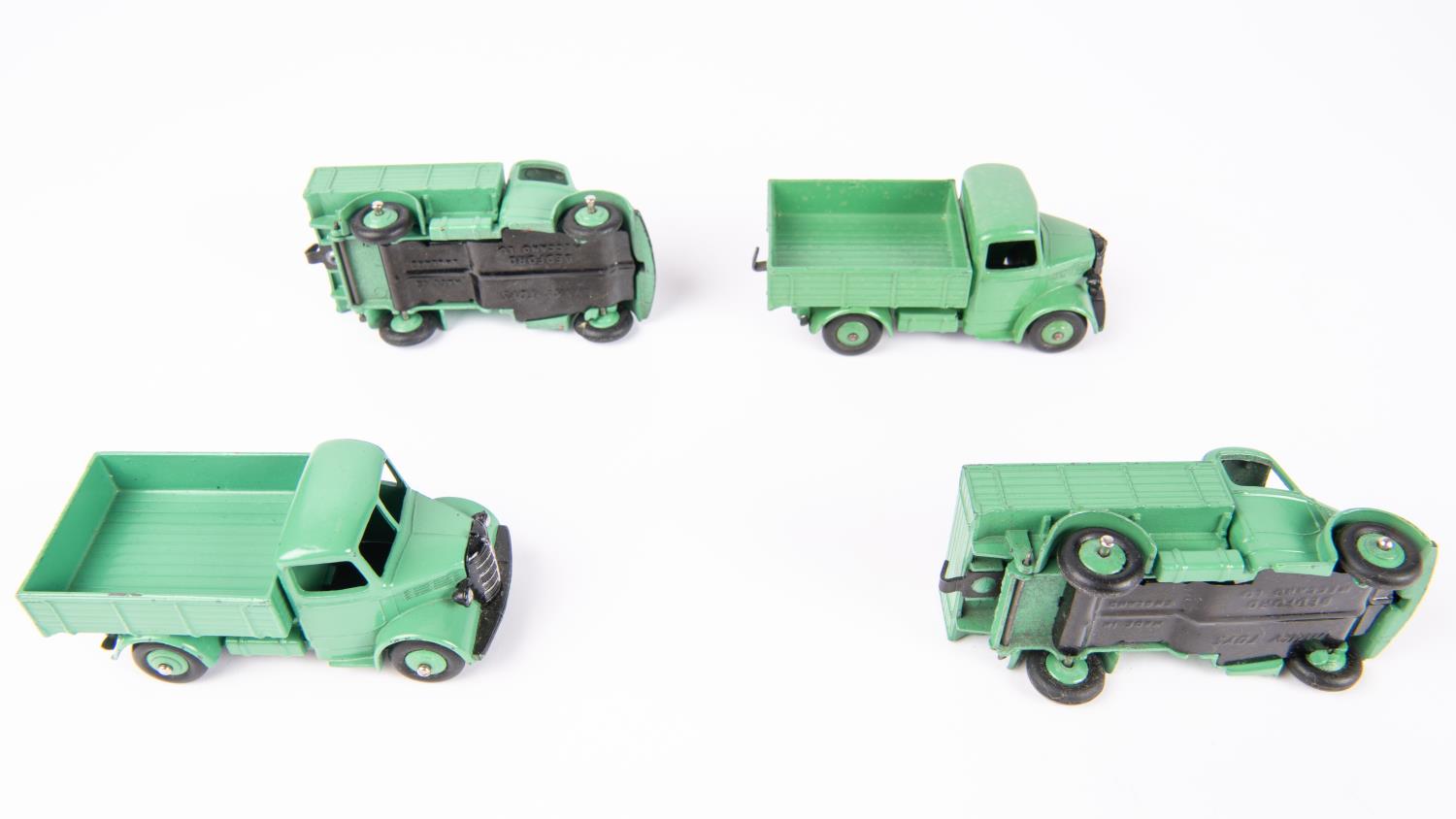 A Dinky Toys Trade Pack of 4 Bedford Trucks (25w). Vehicles with green chassis cab, body and wheels. - Image 2 of 2