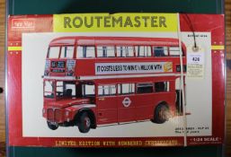 A Sun Star 1:24 scale London Transport Routemaster in red livery with Vernon's Pools and Top Rank