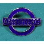A London Transport ADVERTISING cap badge. Dark blue enamel on chrome badge. 'J.R. Gaunt London'