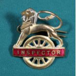 British Railways (Midland Region) INSPECTOR cap badge. Brass and red enamel lion over wheel, with