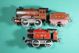 2x Hornby Series O gauge clockwork LMS locomotives. A No.0 0-4-0 tender loco, 5600. Together with an