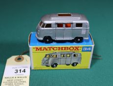 Matchbox Series No.34 Volkswagen Camper. Silver body with low roof, amber glazing, black plastic