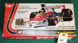 A 1:18 scale Corgi Toys Texaco-Marlboro McLaren M23 F1. In Texaco-Marlboro red & white livey. '