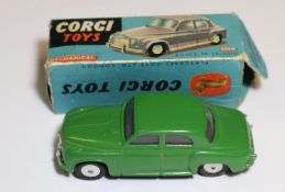 Corgi Toys Rover 90 Saloon (204M). An early mechanical in dark green with a working friction powered