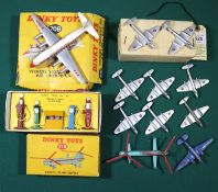 12x Dinky Toys. A trade box of 6x Meteor Twin-Jet Fighters (70E). Bristol 173 Helicopter (715).