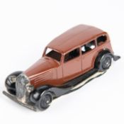 Dinky Toys Vauxhall (30d). An example in dark brown with closed black chassis, black ridged wheels