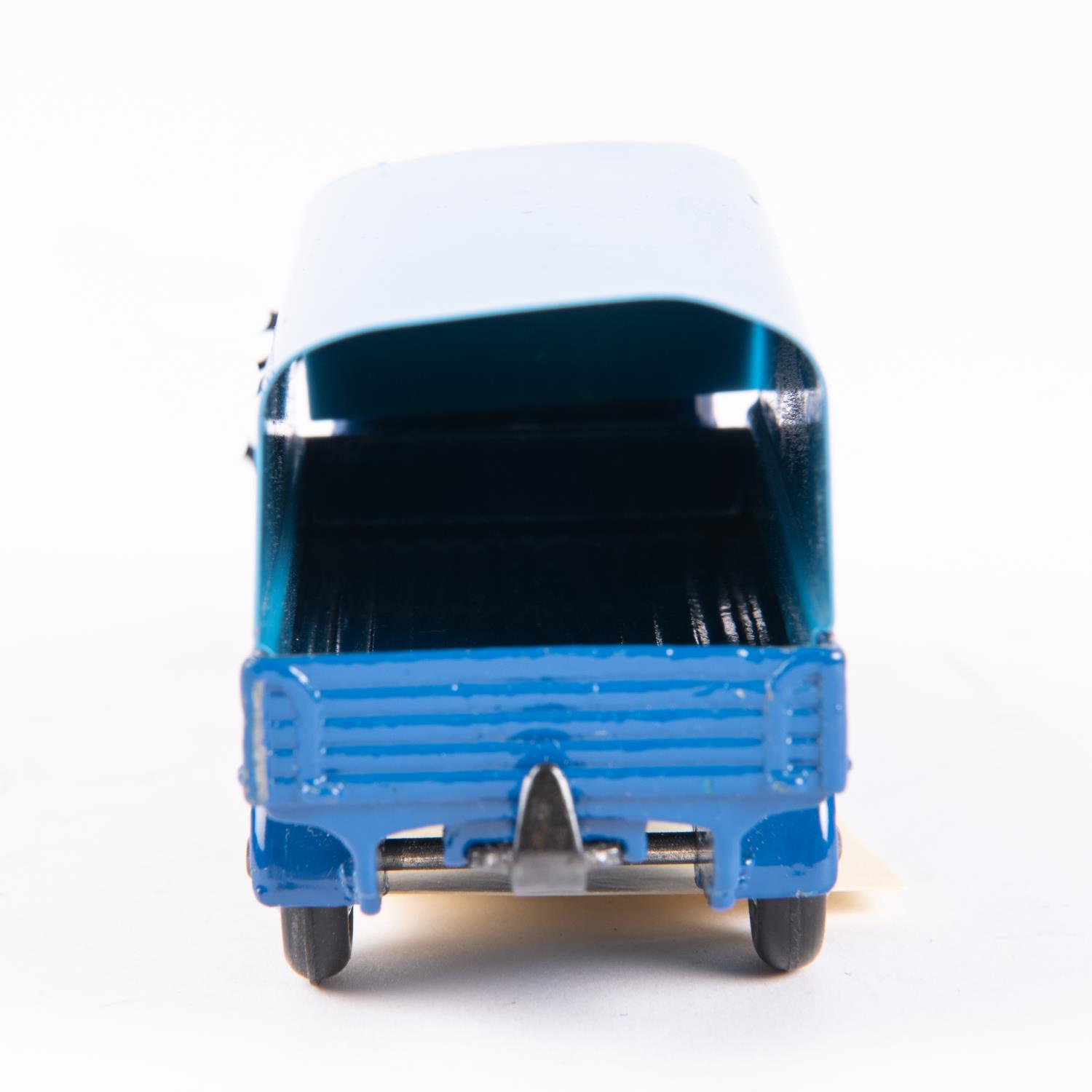 A Dinky Toys Austin Covered Wagon (413). In dark blue with mid-blue tin-plate tilt and wheels. - Image 2 of 4