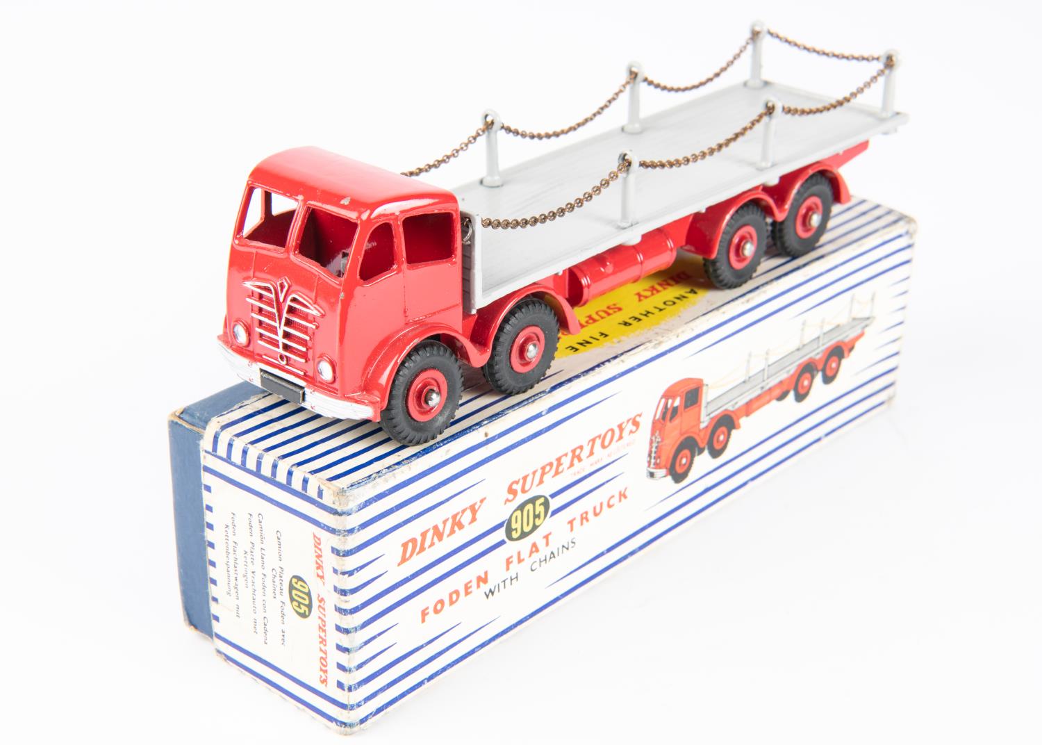 Dinky Toys Foden Flat Truck with Chains (905). Red cab and chassis, grey body, red wheels. Boxed,
