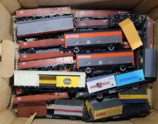 70+ OO gauge railway freight wagons by Hornby, Lima, etc. Including mostly bogie wagons. Many useful