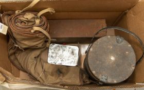 A WWII Russian machine gun ammunition box with linked metal belt; a British officer's bedroll; a